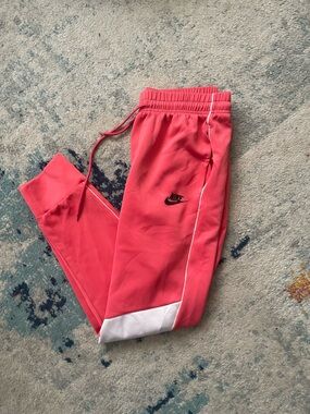 Nike women Coral-Red Joggers with White Trim